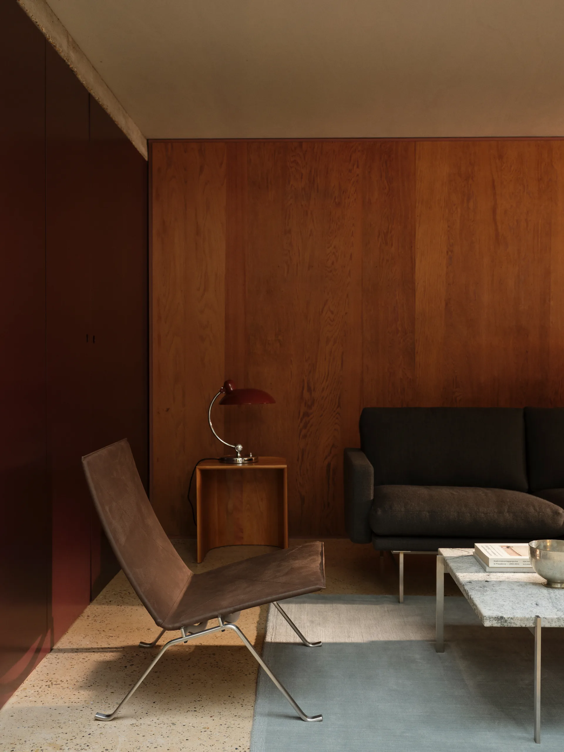 PK22 lenestol, Aura black brown lær-rustfritt stål Fritz Hansen